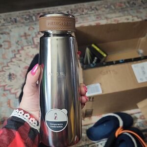 Silver and Brown Coffee Bottle